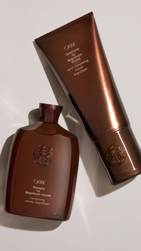 Oribe apply to towel‑dried hair demonstration showing improved combing