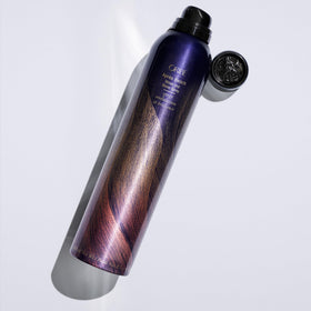 Oribe Après Beach 8.5oz beside a ruler to show bottle size and travel-friendly benefit