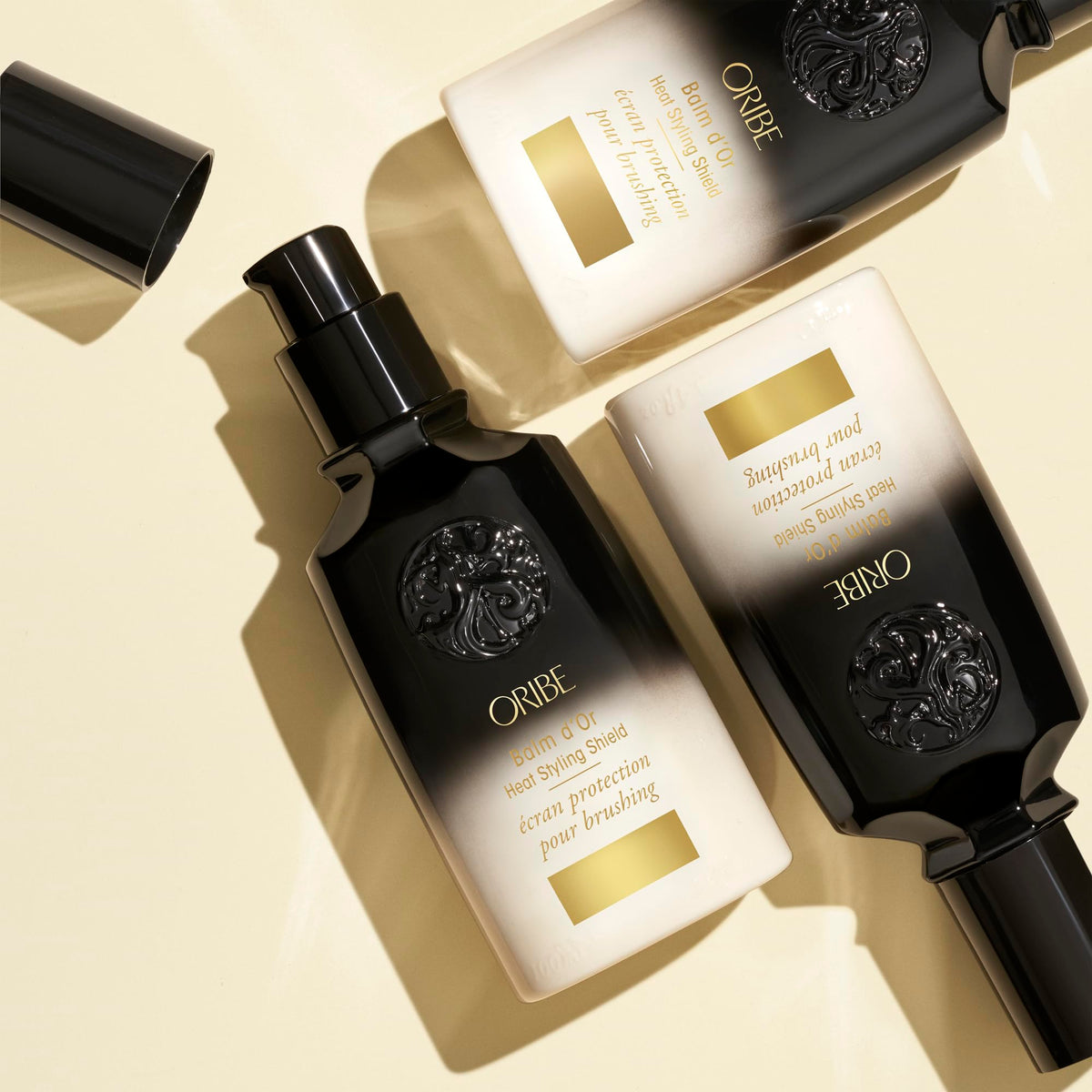 Oribe Balm D'Or cream texture close-up displaying smooth consistency for even application