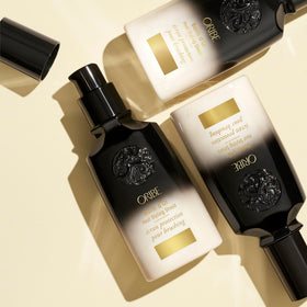 Oribe Balm D'Or cream texture close-up displaying smooth consistency for even application