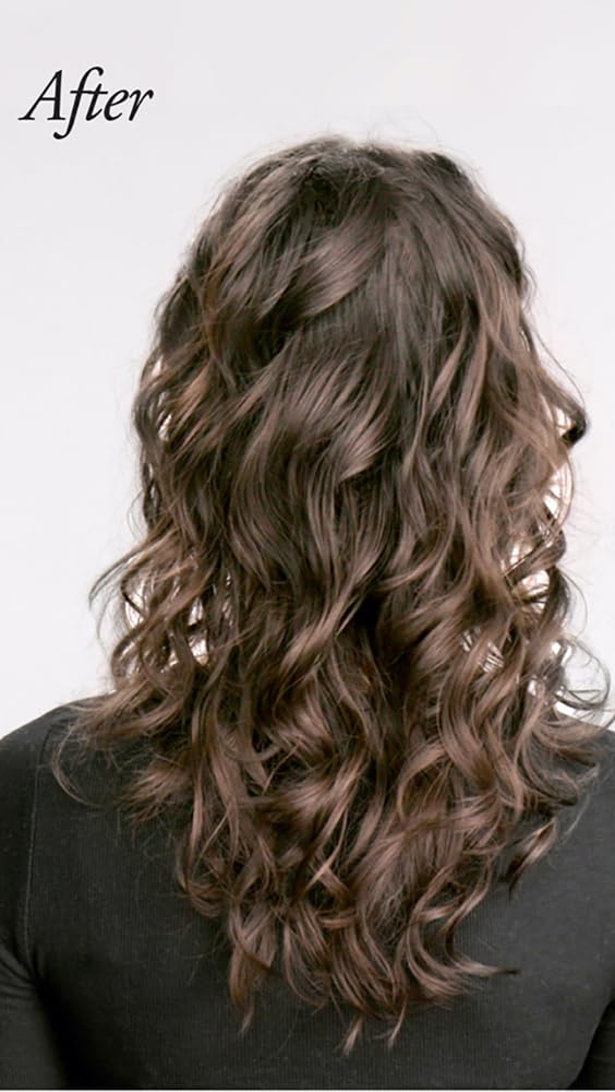 Oribe conditioner on palm demonstrating detangling and smoothing action