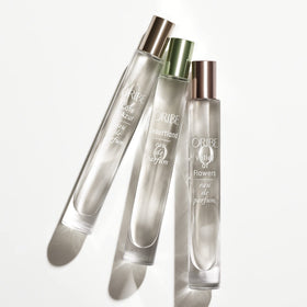 ORIBE travel Côte d'Azur tucked inside a beach bag evoking Riviera-inspired travel and summer warmth