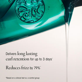 Oribe Curl Gloss held in hand to show 5.9 fl oz scale for sizing clarity