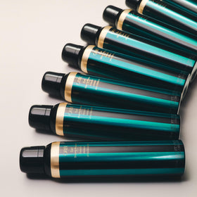 Oribe Curl Shaping Mousse foam texture close-up illustrating lightweight consistency