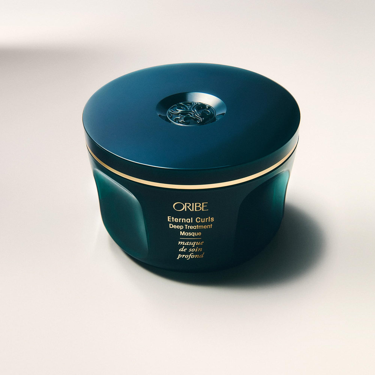ORIBE label close-up showing product name and clear usage benefit