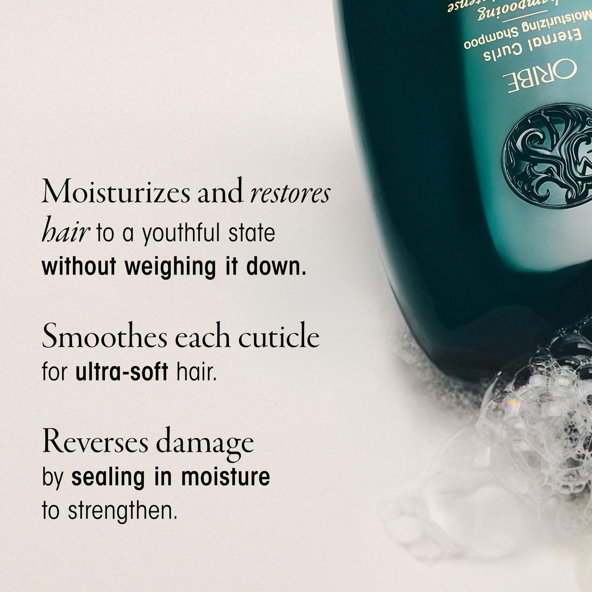 Oribe Eternal Curls shampoo being applied to curly hair for gentle cleansing