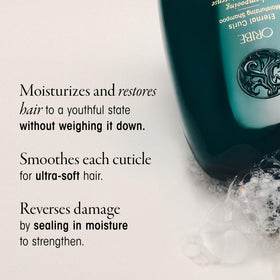 Oribe Eternal Curls shampoo being applied to curly hair for gentle cleansing