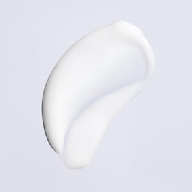 Oribe Featherbalm applied to hair demonstrating smoothing and shine benefit