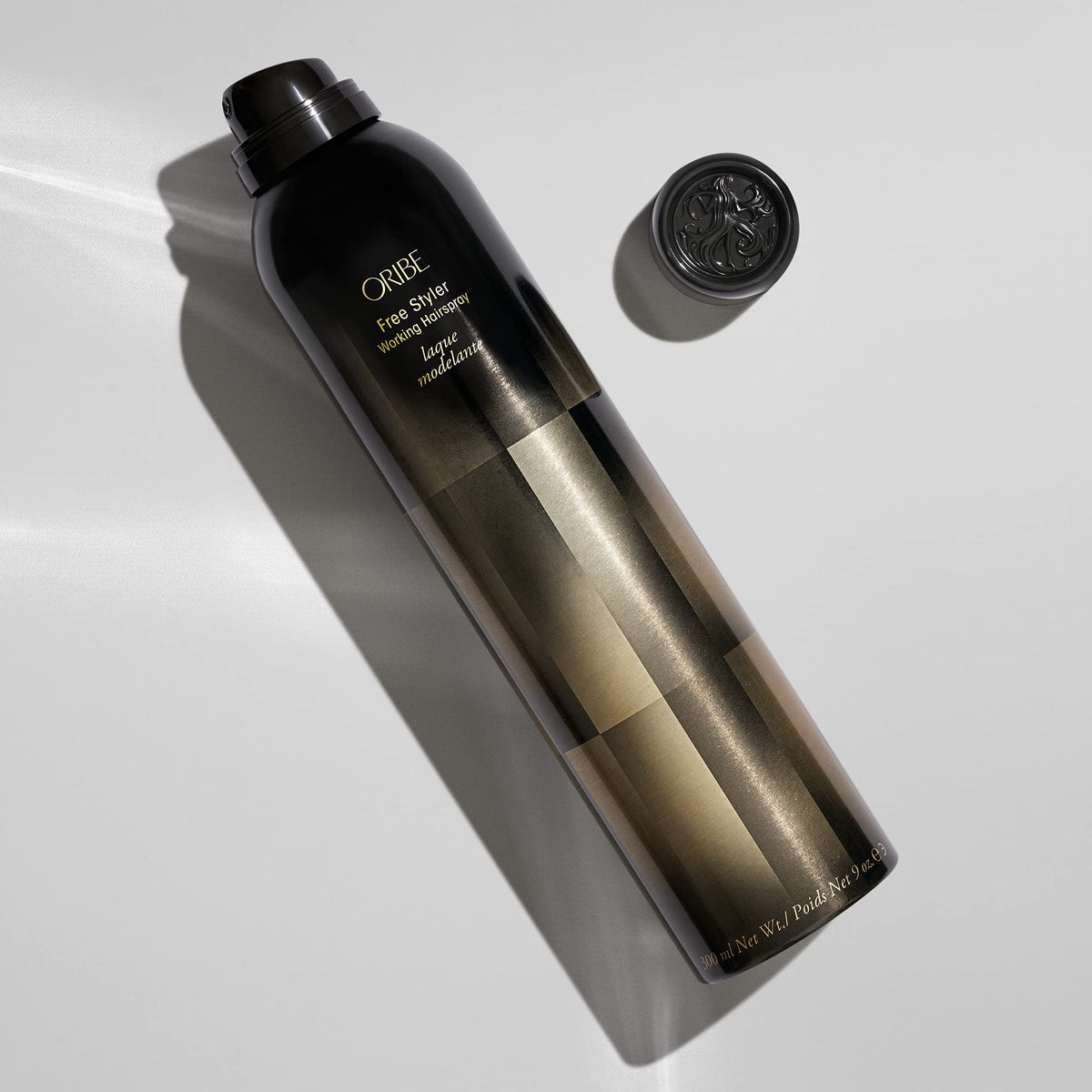 Oribe Free Styler ultra-fine mist closeup demonstrating even spray and soft finish benefit