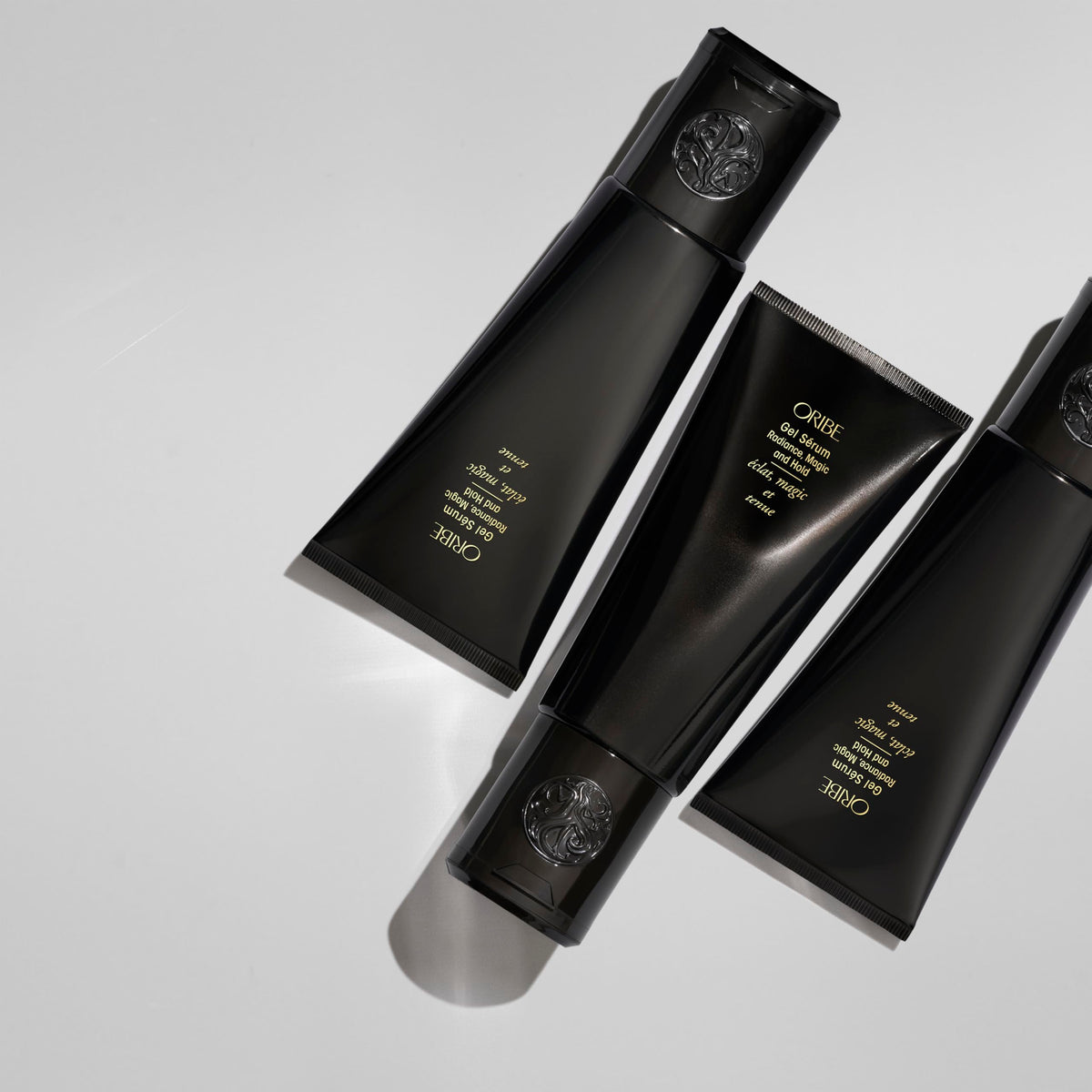 ORIBE styling scene with Gel Radiance applied for frizz control and radiant finish
