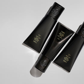 ORIBE styling scene with Gel Radiance applied for frizz control and radiant finish