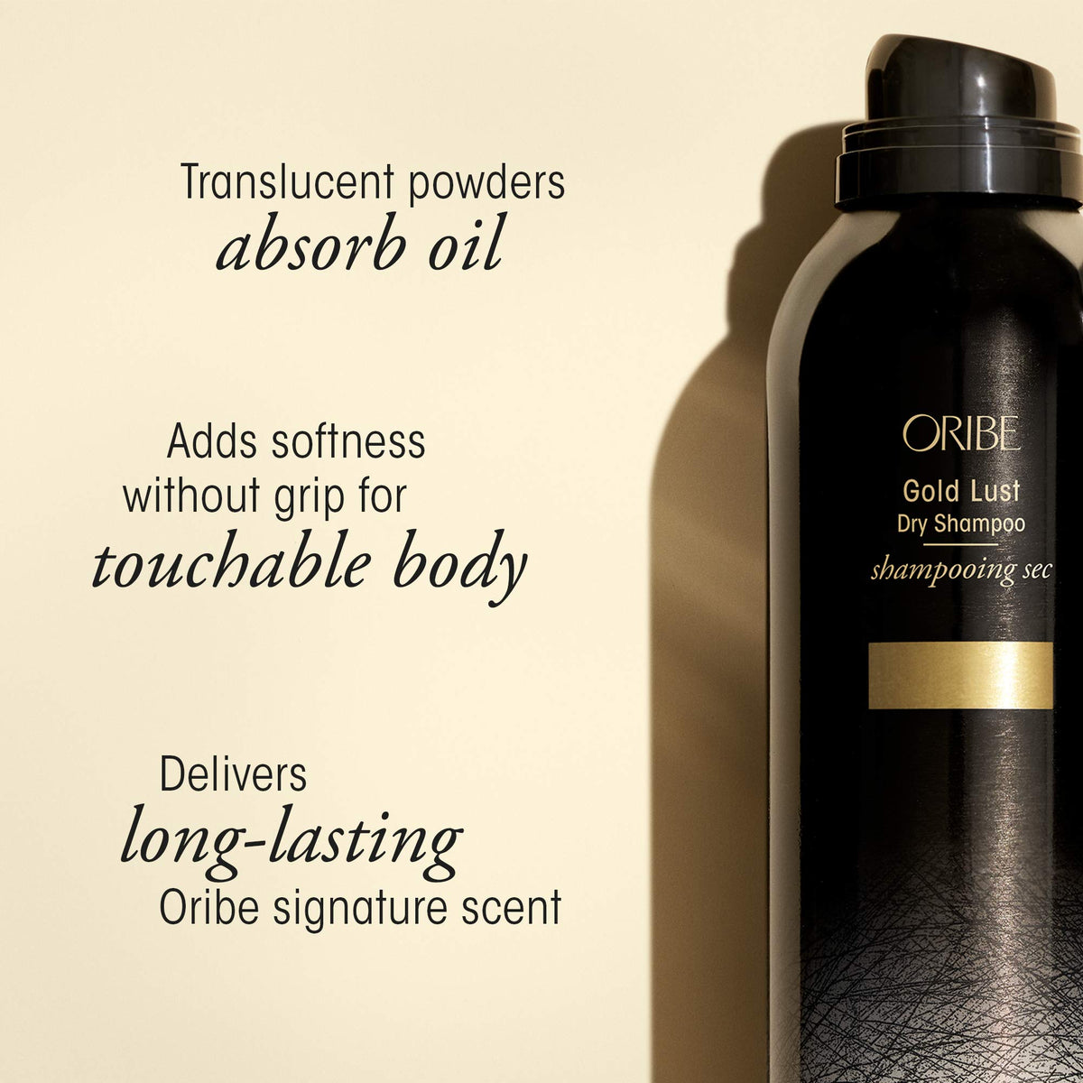 Oribe Gold Lust dry shampoo sprayed at roots in use for instant oil absorption
