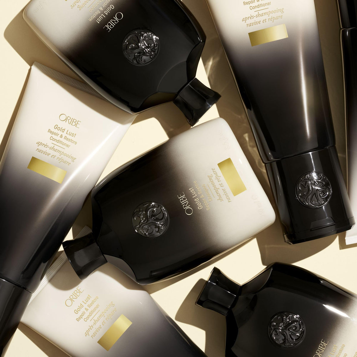 Oribe bottle staged in shower showing everyday use benefit