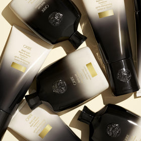 Oribe bottle staged in shower showing everyday use benefit