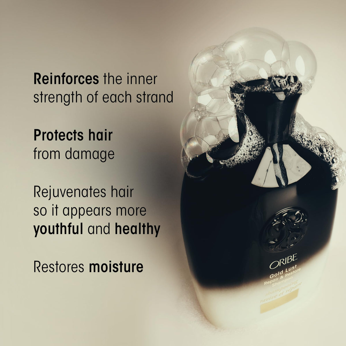 Oribe Gold Lust close-up of pouch texture and label highlighting premium formula benefit