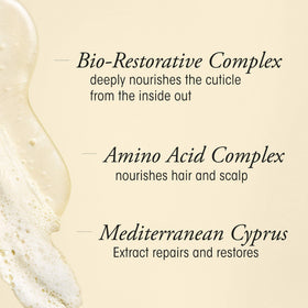 Oribe bottle in hand dispensing shampoo showing easy application benefit