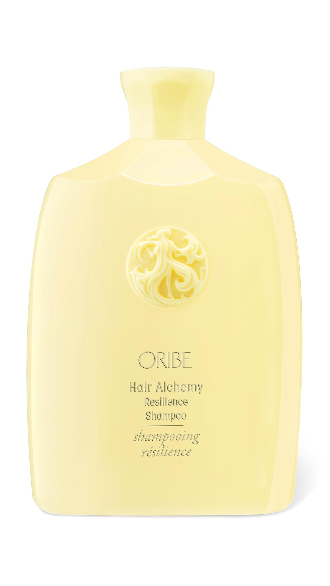 Oribe bottle front view showing Hair Alchemy Resilience shampoo packaging and luxe design