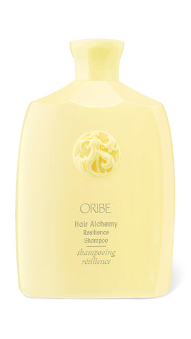 Oribe bottle front view showing Hair Alchemy Resilience shampoo packaging and luxe design
