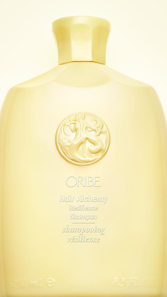 Oribe botanicals with daisy and honeysuckle representing strengthening plant extracts