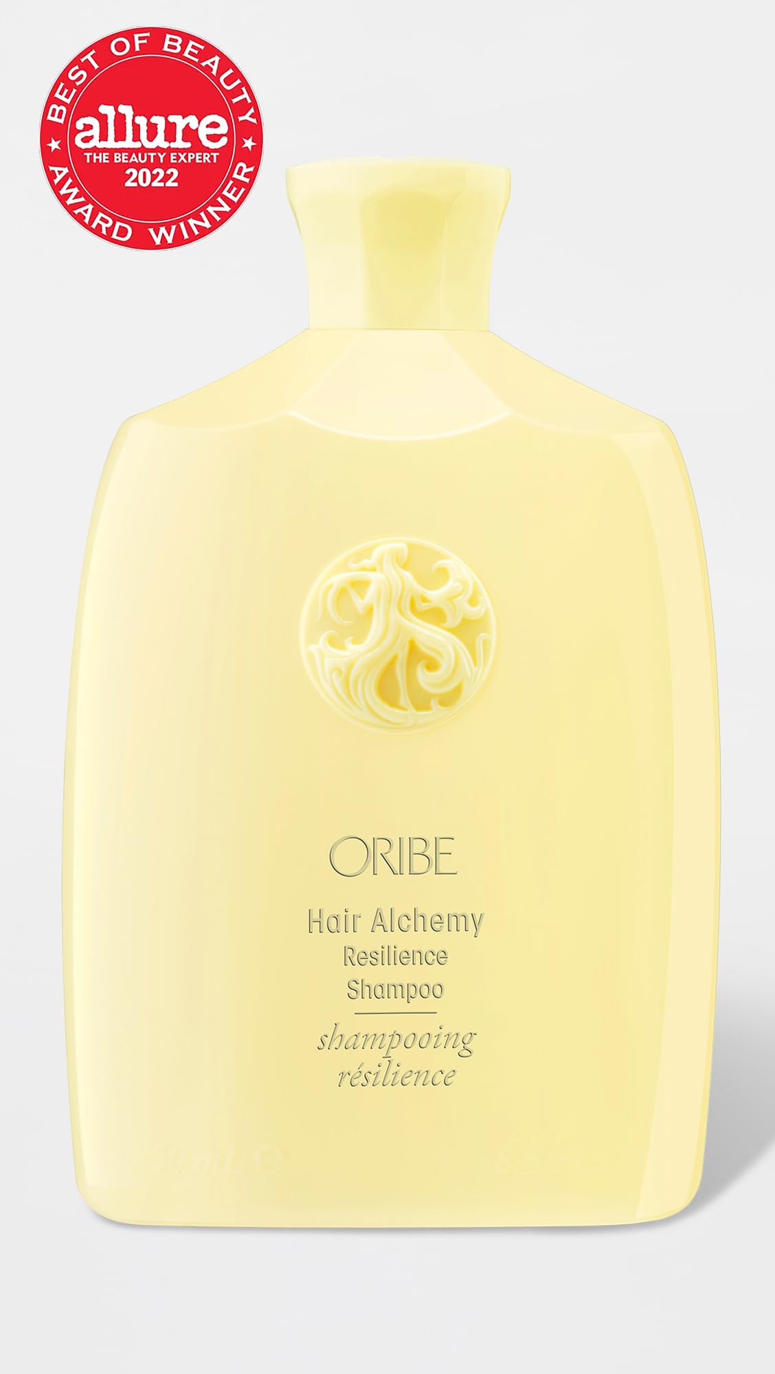 Oribe pump and cap close-up highlighting precise dispensing and premium finish
