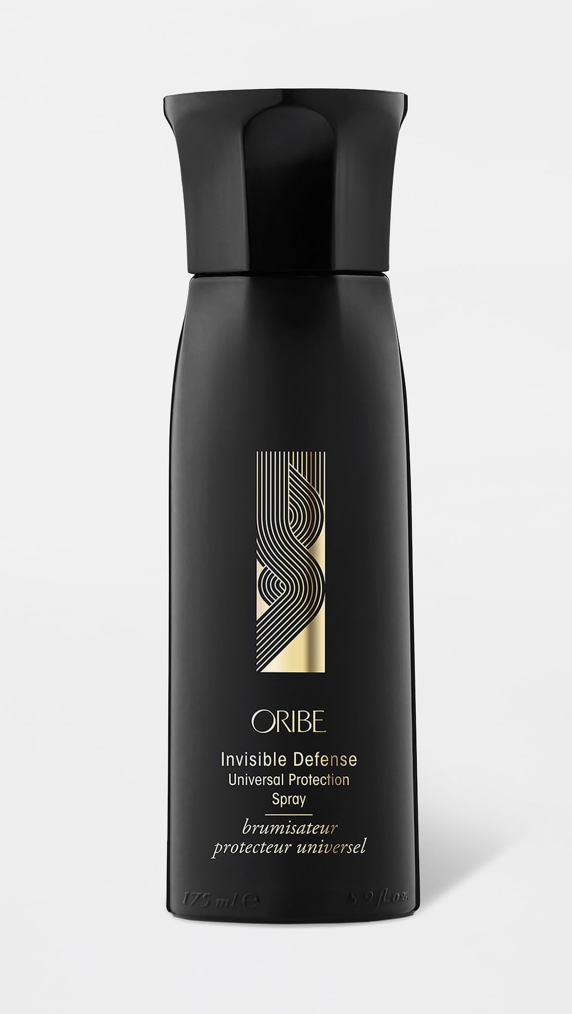 Oribe Invisible Defense fine mist spray detail demonstrating even coverage benefit