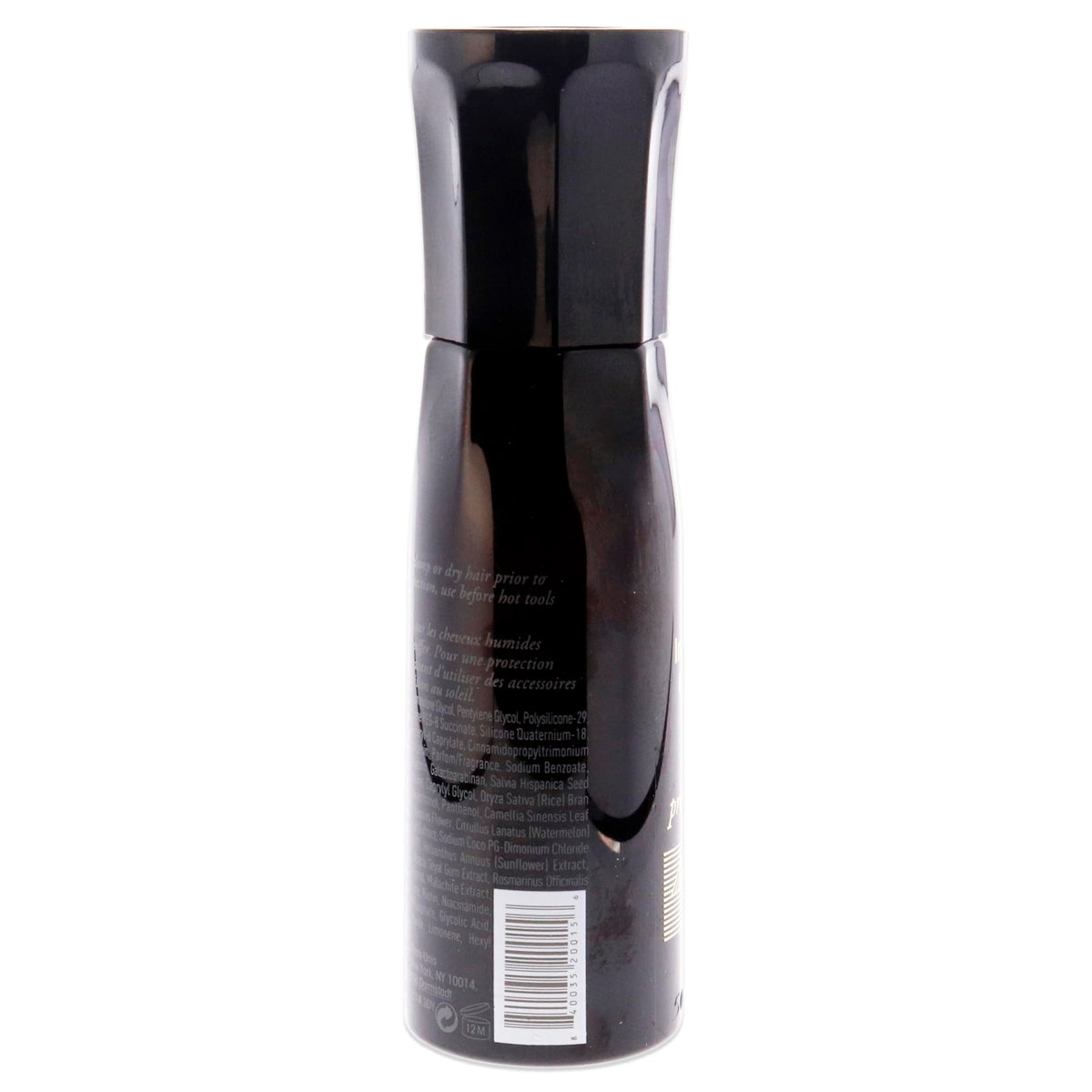 Oribe spray mist in use on hair demonstrating lightweight protection and frizz control