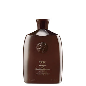 Oribe bottle front view showing branding and size, conveys luxury
