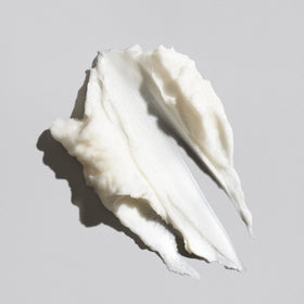Oribe masque cream texture close-up showing rich formula for deep moisture