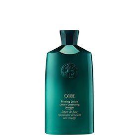 Oribe bottle front view showing brand and sleek design for salon benefit