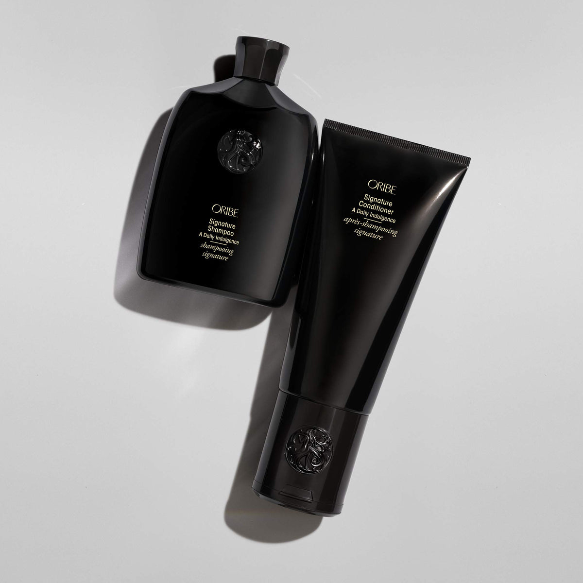 Oribe product label closeup showing ingredients and clean-formula benefits