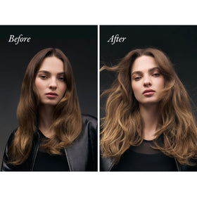 Oribe 2.1oz spray beside a hand to show travel-friendly size and portability
