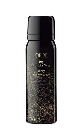 Three Oribe travel-size products lined up showing compact convenience for travel