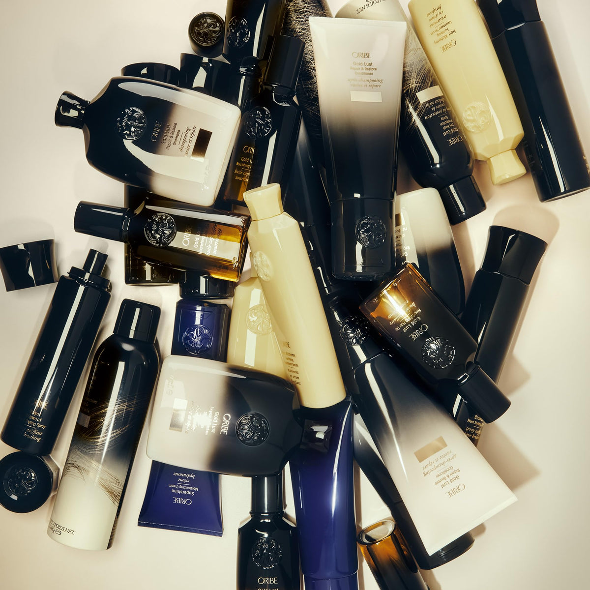 Oribe Royal Blowout with travel pouch flatlay demonstrating portability and styling readiness