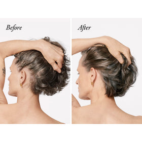 ORIBE applying spray to roots with fingers to promote instant lift