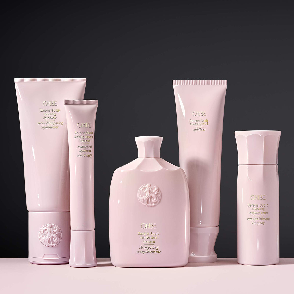 Oribe Serene Scalp shampoo on bathroom shelf in luxury setting conveying salon-quality benefit