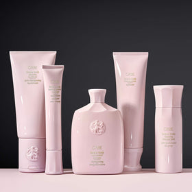Oribe Serene Scalp shampoo on bathroom shelf in luxury setting conveying salon-quality benefit
