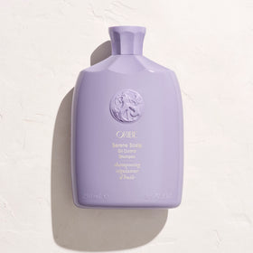 oribe in-shower application showing scalp massage and oil-control benefit