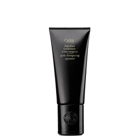 Oribe Signature Conditioner front bottle showing elegant packaging and premium finish