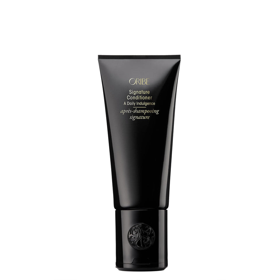 Oribe Signature Conditioner front bottle showing elegant packaging and premium finish