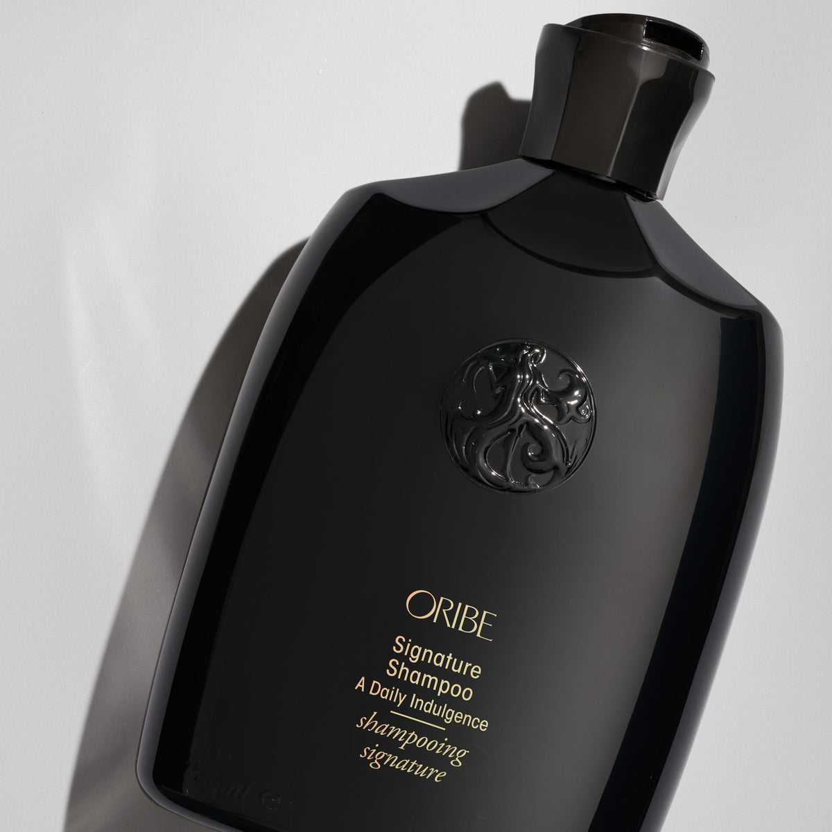 ORIBE back label with ingredients and safety info highlighting treatment-friendly formula