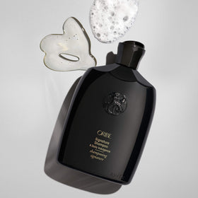 Oribe signature shampoo creamy texture closeup showing rich moisturizing feel
