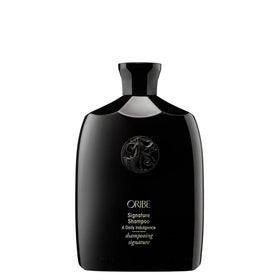 ORIBE front bottle showing elegant packaging and luxe daily cleanser benefits