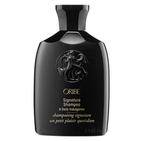 Oribe signature shampoo front bottle showing premium packaging and travel benefit