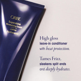 Oribe bottles in hand for size comparison showing travel-friendly capacity