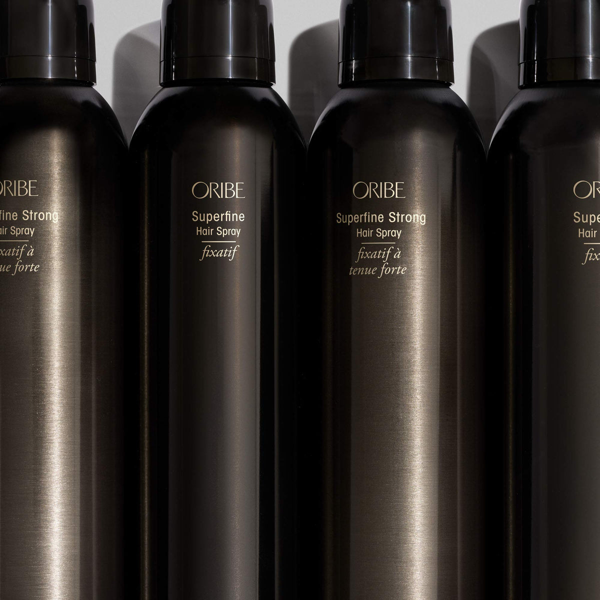 Oribe Superfine in a glam styling scene showing glossy finish and flexible hold for finished looks