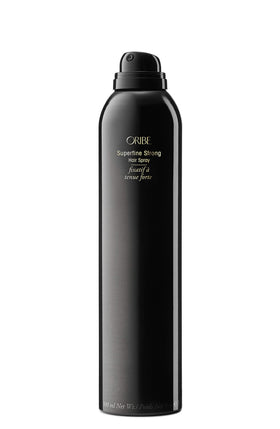 Close-up of superfine mist spray pattern from Oribe delivering even coverage