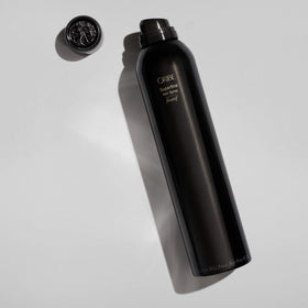 Oribe Superfine mist in hair showing lightweight coverage and soft hold that preserves movement