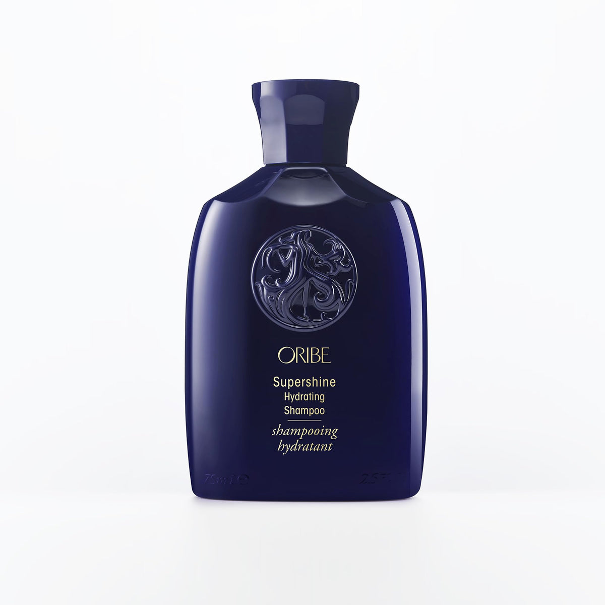 Oribe Supershine front bottle showing travel-size design and luxe finish