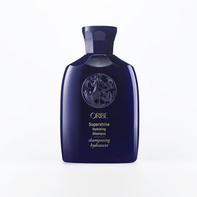 Oribe Supershine front bottle showing travel-size design and luxe finish