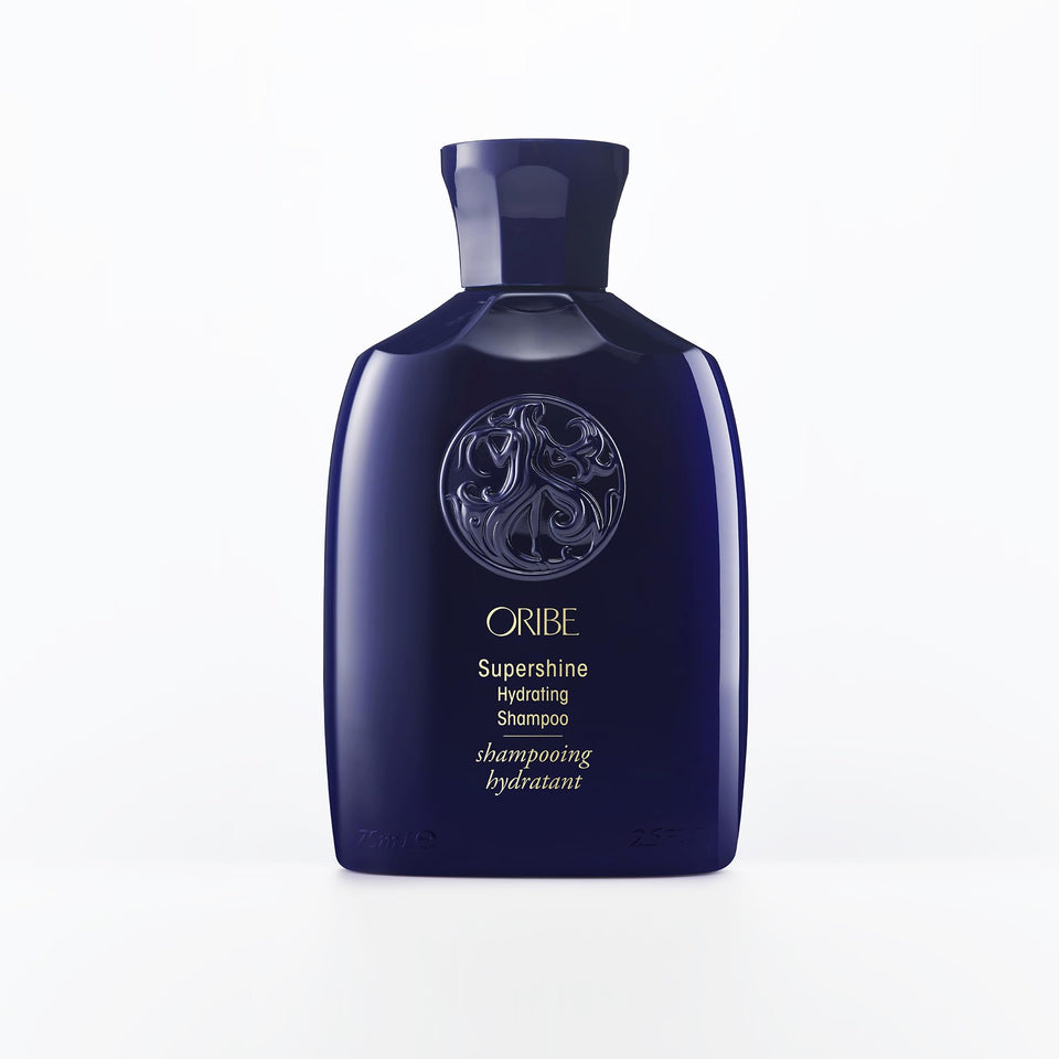 Oribe Supershine front bottle showing travel-size design and luxe finish